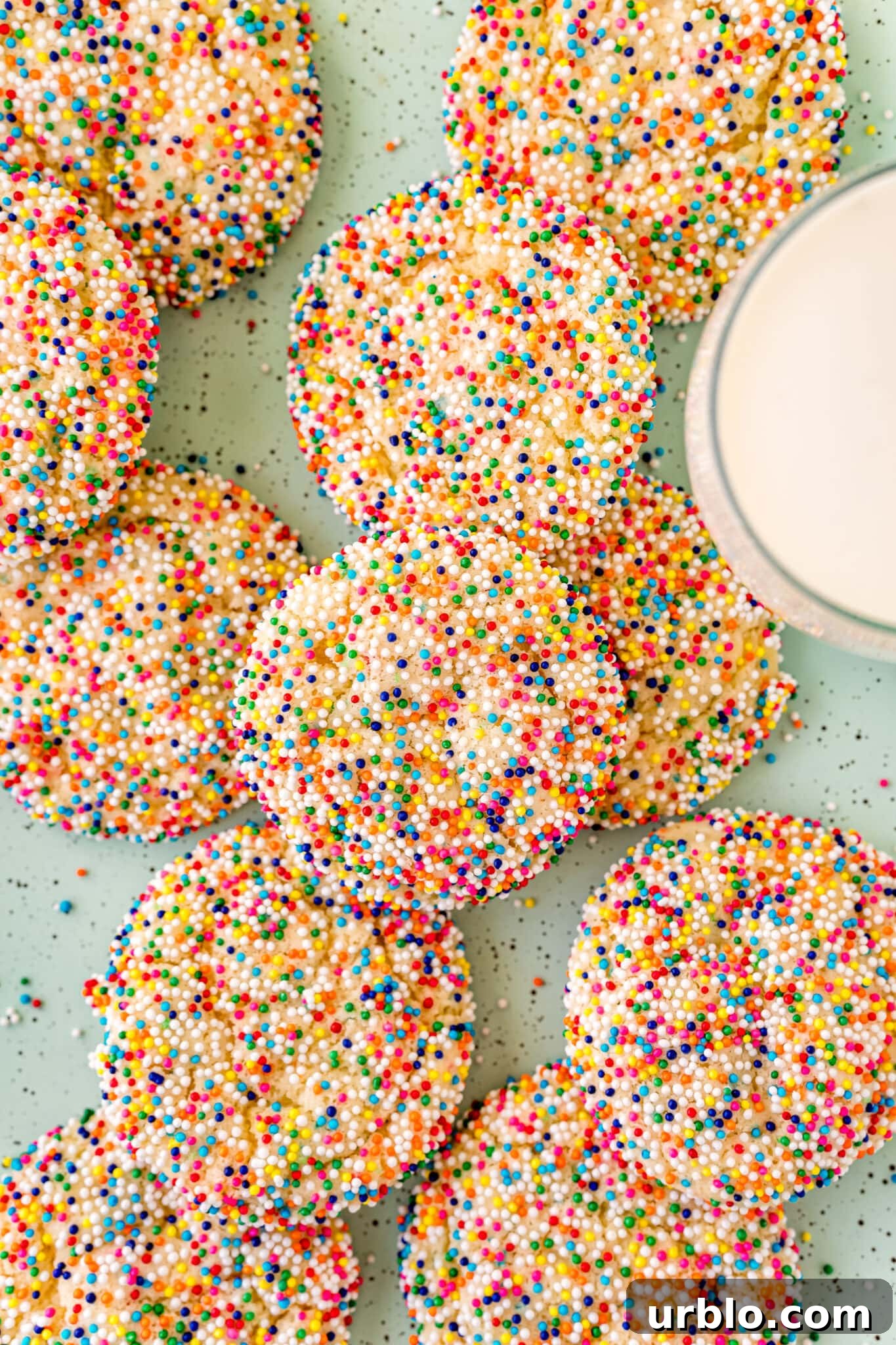 funfetti rainbow sprinkle cookies on cookie sheet