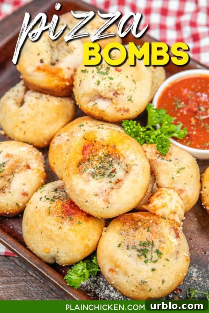 baking tray of pizza bombs with pizza sauce with text overlay