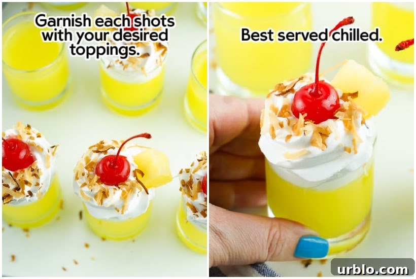 Shots garnished with whipped topping, toasted coconut, pineapple, and a cherry.