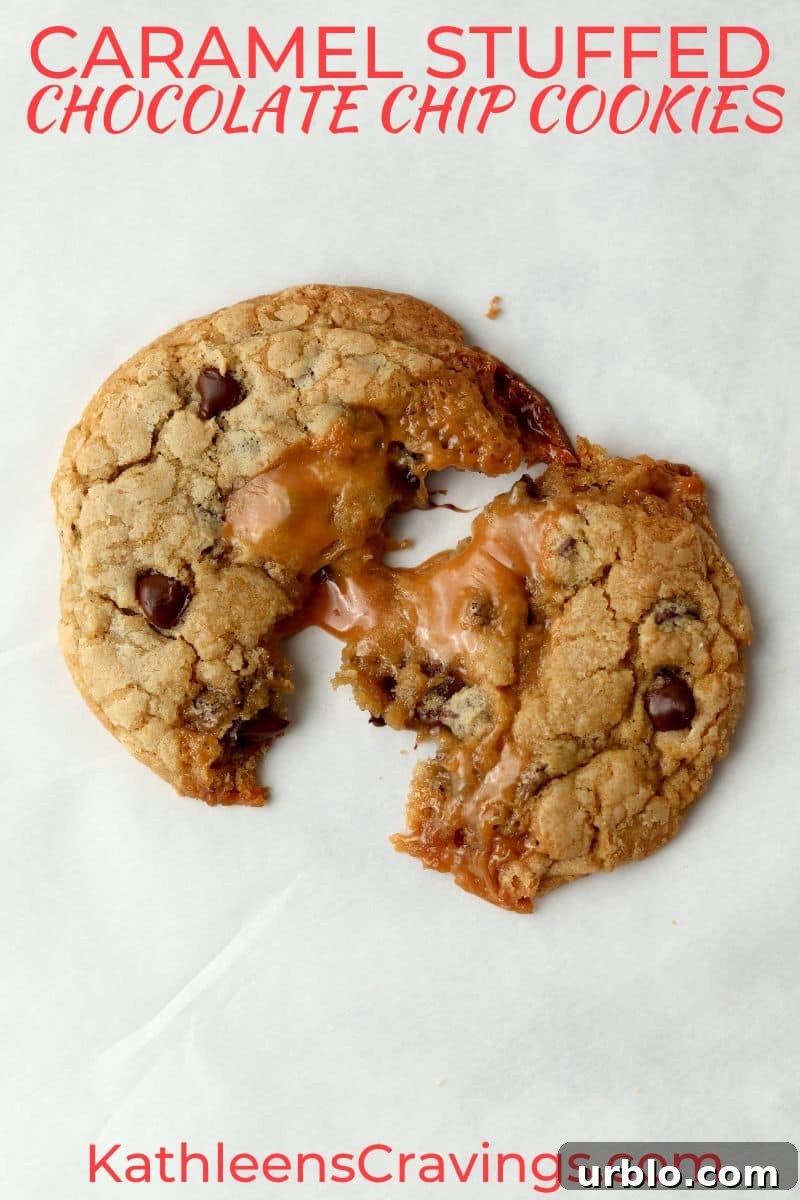 caramel stuffed chocolate chip cookie broken in half