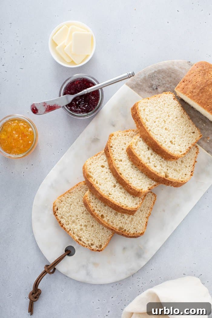 Slices of english muffin bread arranged on a marble board