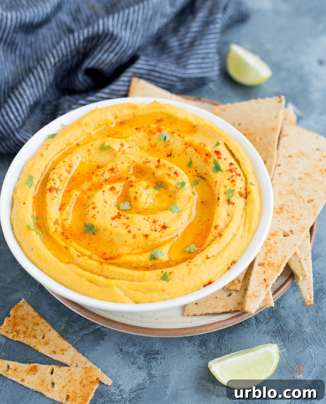 This Sweet Potato Hummus is creamy, delicious and has a hint of sweetness from the Sweet potato. This homemade hummus is great as a dip or as a healthy spread on wraps and sandwiches.