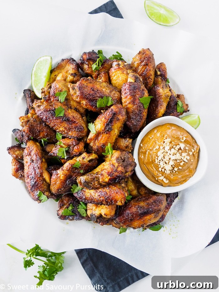 Baked Thai Chicken Wings with Peanut Sauce on the side.