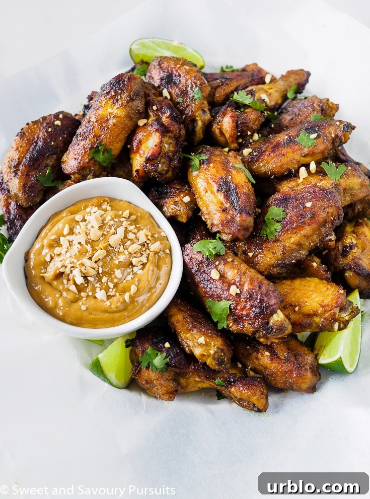 Baked Thai Chicken Wings with Peanut Sauce on the side.