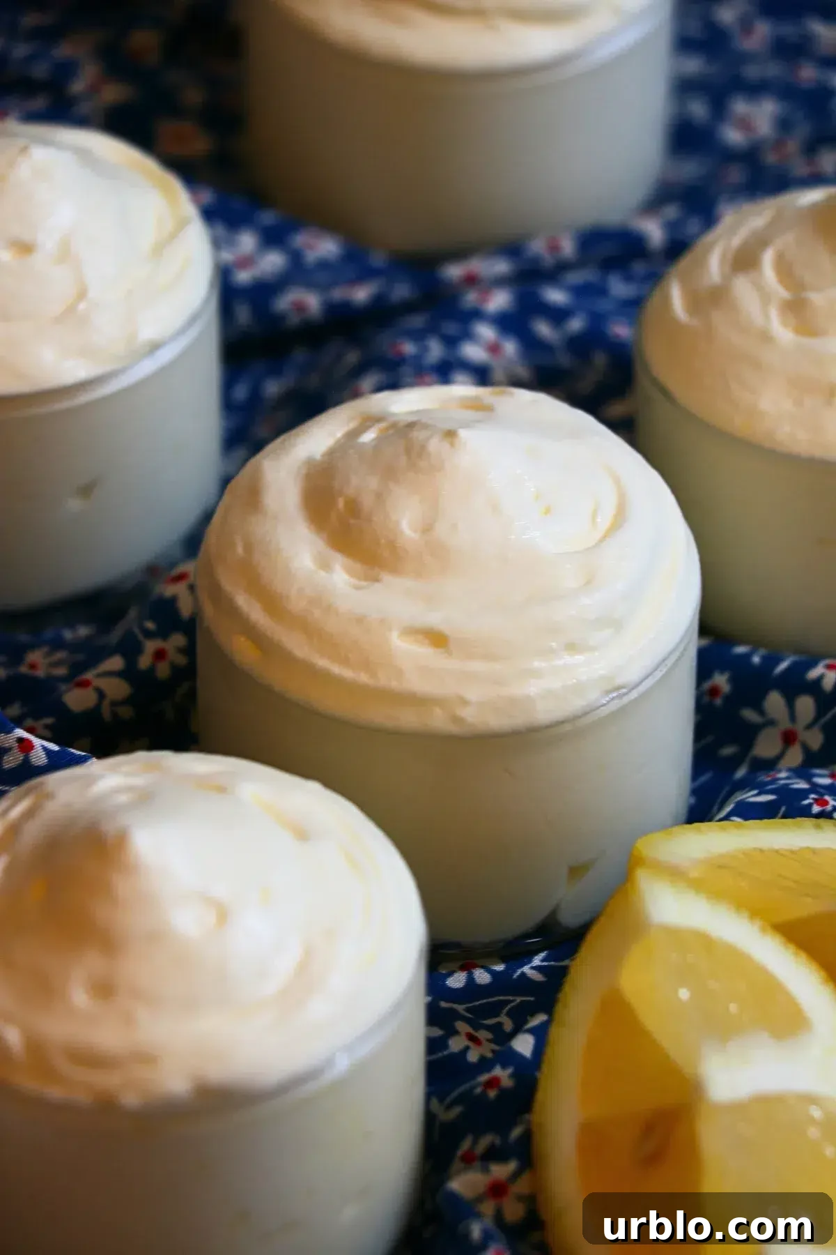 Silky Lemon Mousse Recipe with Fresh Citrus Zest 4 homemade lemon mousse in glass cups