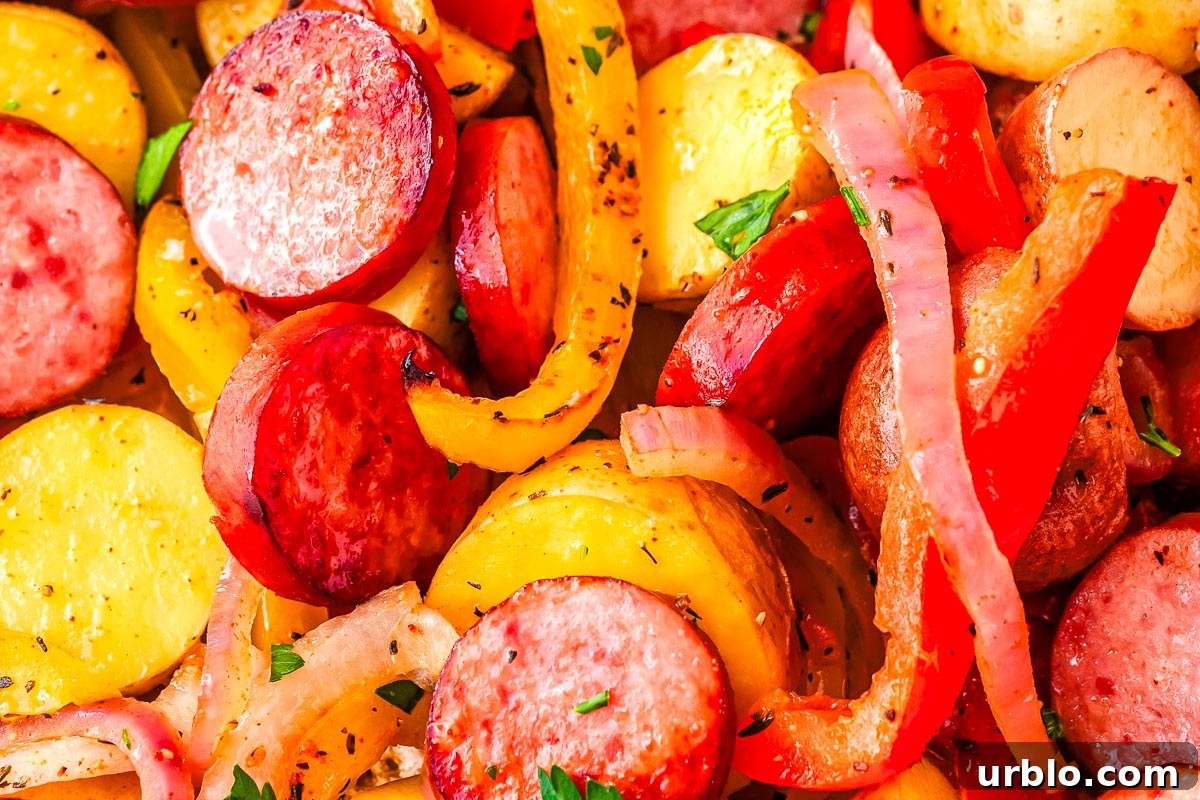 Sheet Pan Smoked Sausage with Roasted Potatoes 3 A close-up of the finished sausage and potatoes.