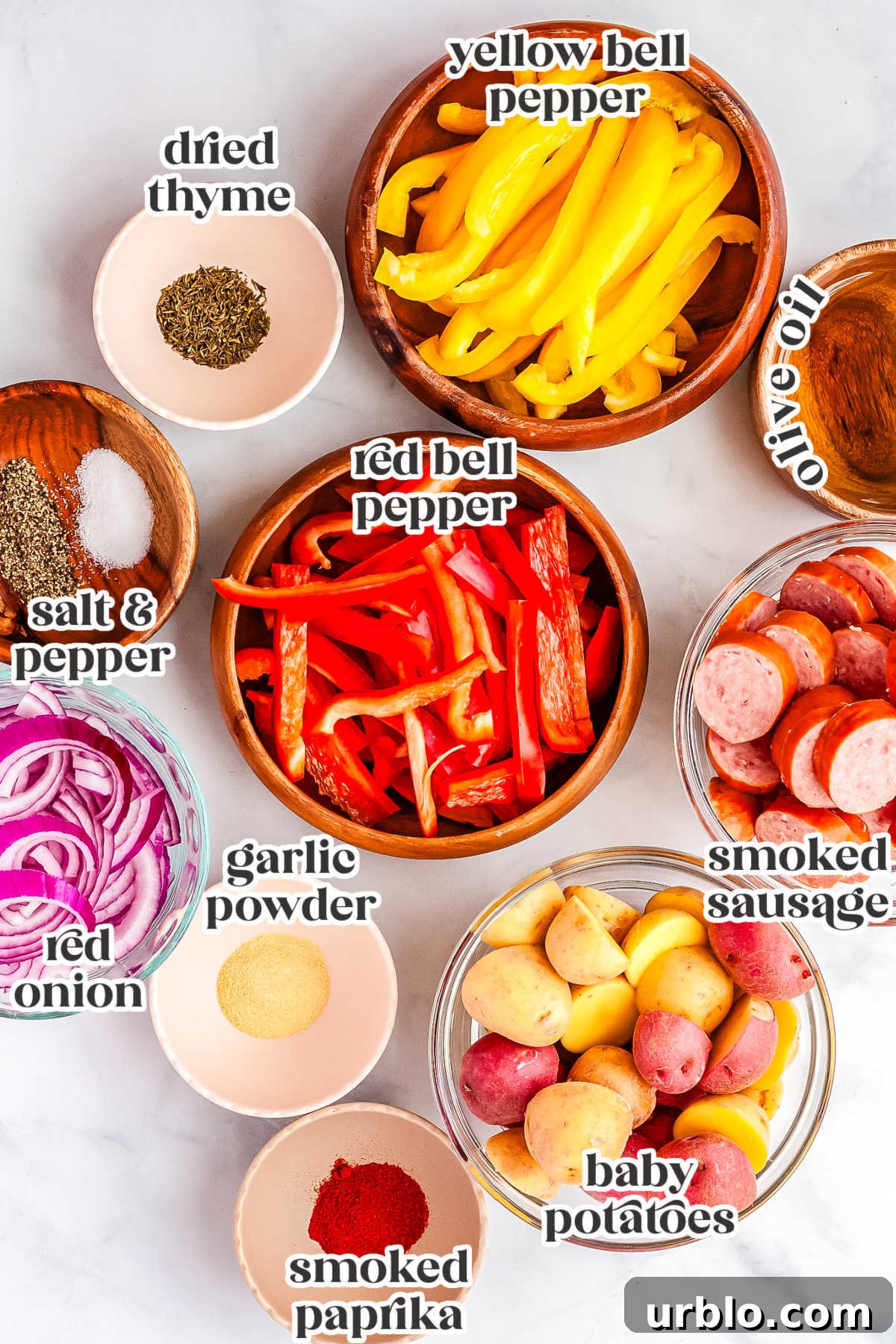 Sheet Pan Smoked Sausage with Roasted Potatoes 4 The ingredients to make this recipe with text overlay for Pinterest.