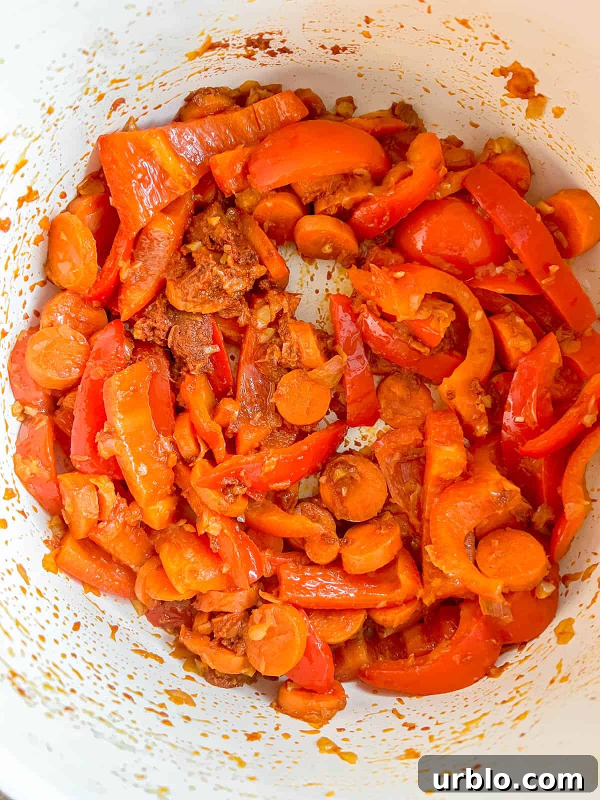 Vegan Thai Red Curry (Paleo-Friendly) 6 Red curry paste added to the pan.