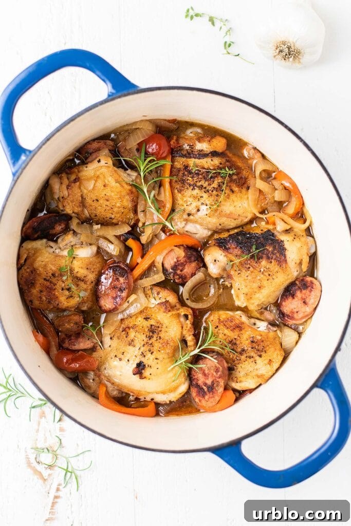Scarpariello Chicken Recipe: Italian Peppers & Vinegar 9 A blue pot filled with chicken scarpariello.