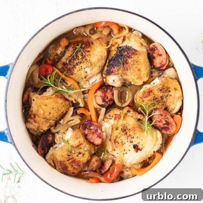 A blue pot filled with chicken scarpariello.
