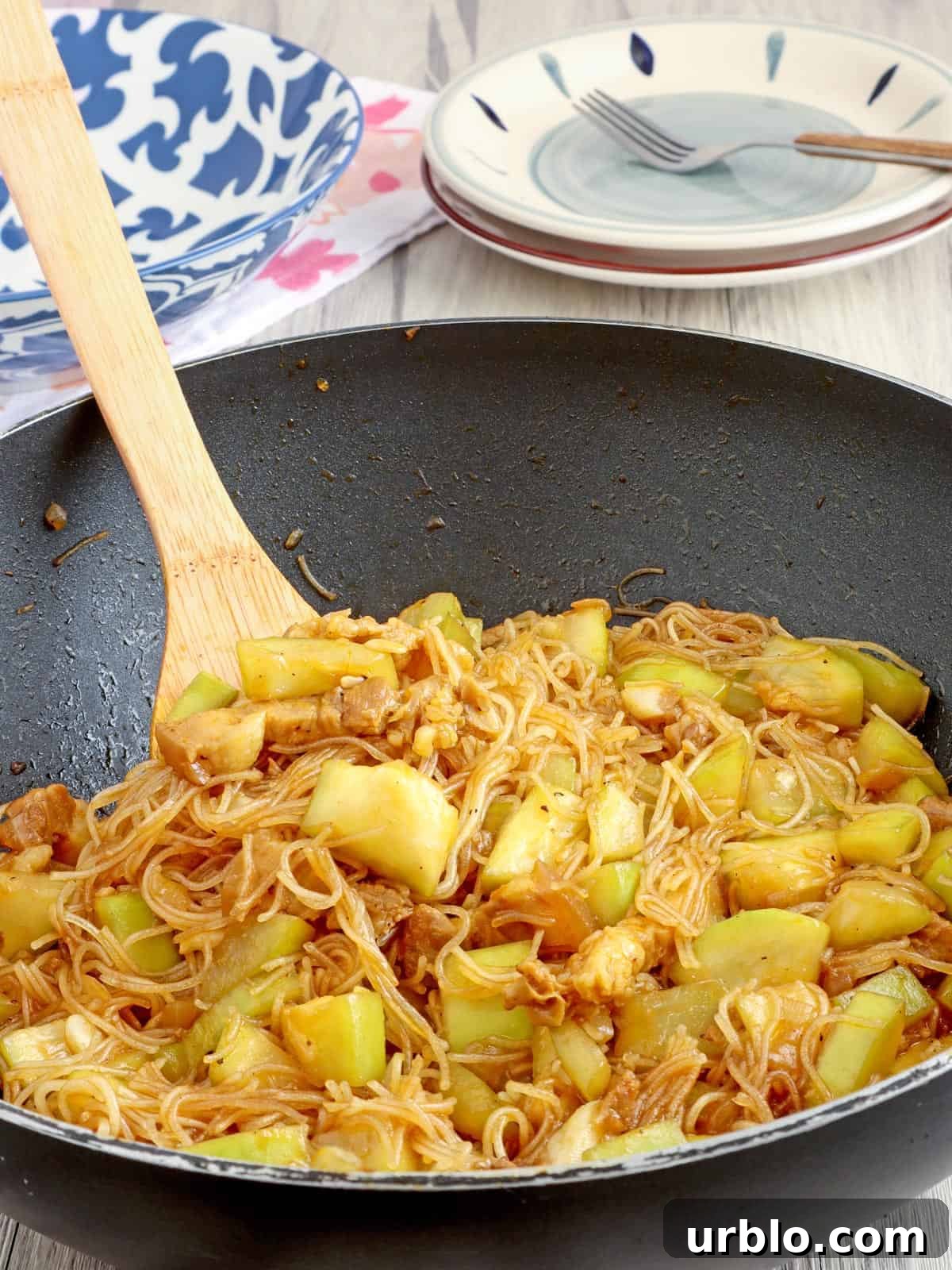 Pancit Upo Recipe: Filipino Bottle Gourd Noodles 5 pancit upo in a wok
