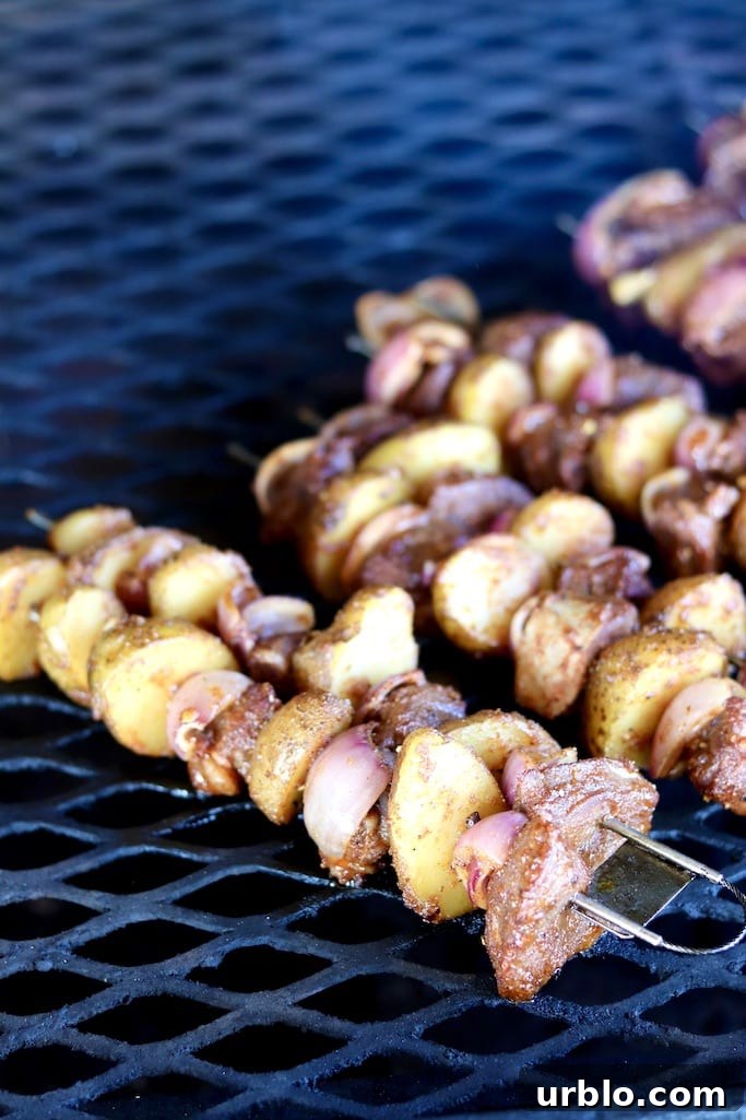 Grilling steak and potato skewers Grilling steak and potato kabobs