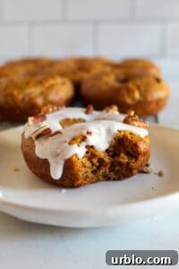 bite of a gluten free carrot cake donut